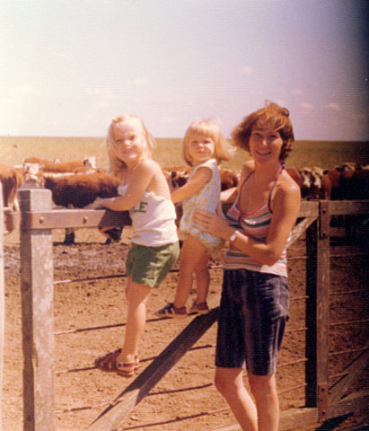 The girls were fascinated by the cows and calves